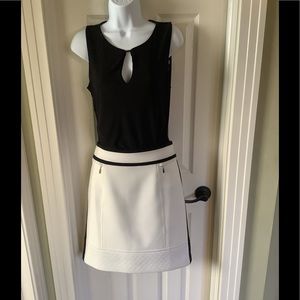 White House black-market cream and black skirt